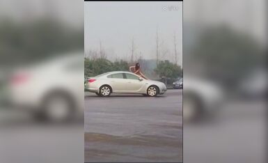 A young girl who was dumped by her ex-boyfriend and was so upset that she stopped a car naked on his wedding day to ask for justice.