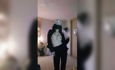 A pretty girl doing the Michael dance with tits. See if she looks like a female version of Michael. Nice tits.